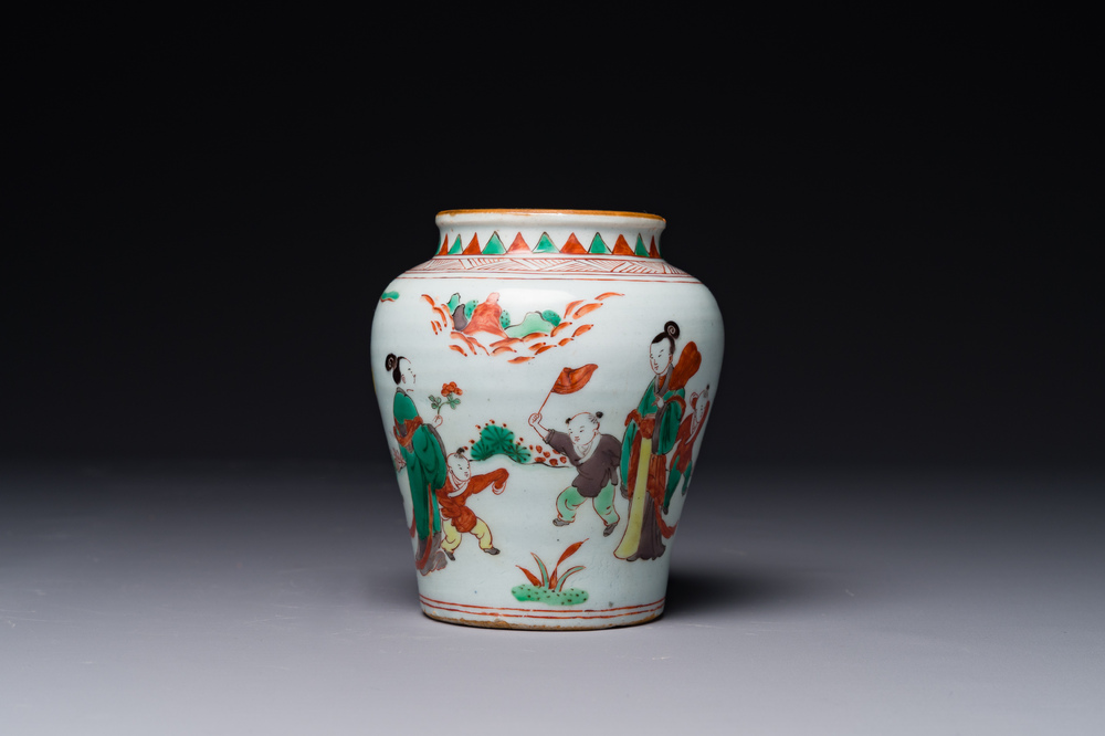 A small Chinese wucai jar with figures in a landscape, Transitional period