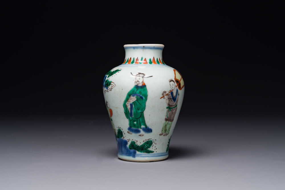 A small Chinese wucai jar with figures in a landscape, Transitional period