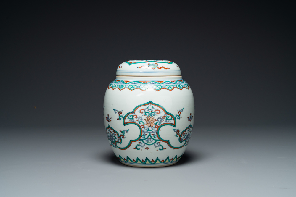 A Chinese doucai 'lotus scroll' jar and cover, Kangxi/Yongzheng
