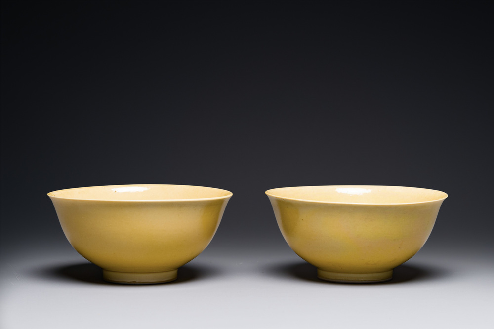 A pair of Chinese monochrome yellow-glazed bowls, Yongzheng mark, 19th C