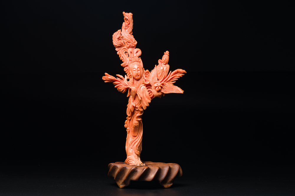 A Chinese red coral figure of Xiwangmu on wooden stand, 19/20th C.