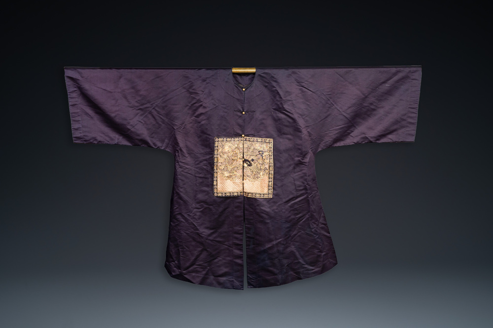 A Chinese dark blue silk overcoat with gold thread embroidered 'rank badges' with wild geese, 19th C.