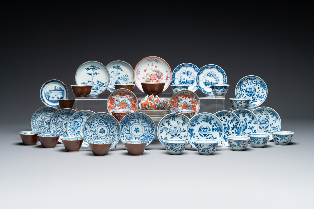 A collection of 23 Chinese cups and saucers, Kangxi/Qianlong