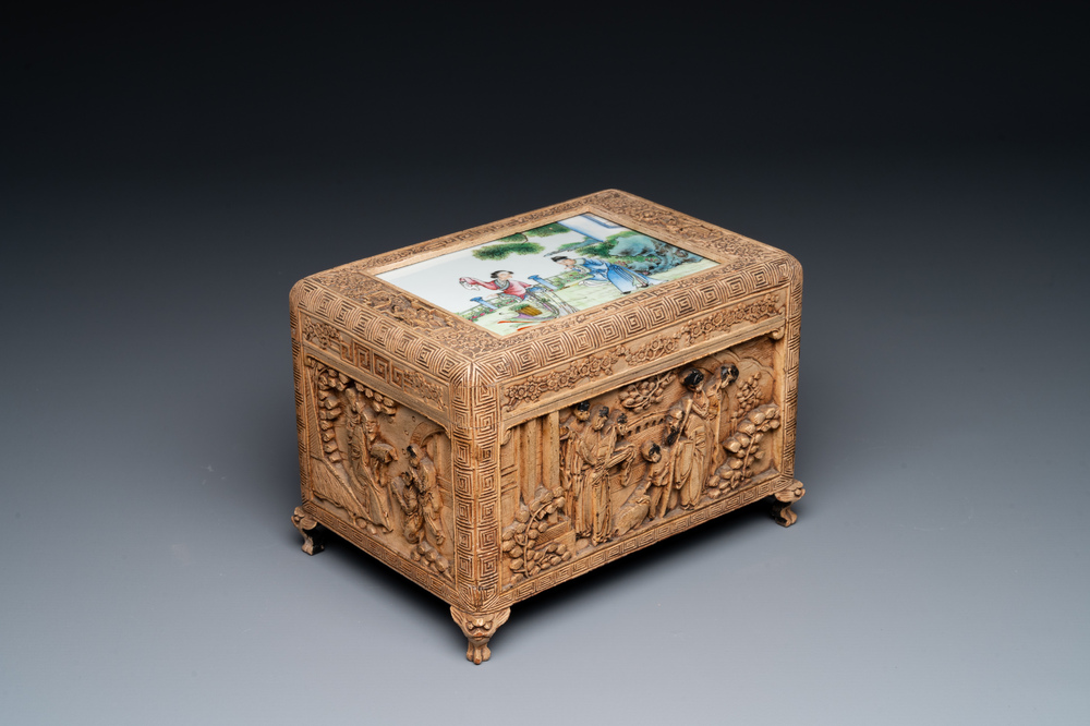 A Chinese Canton carved wooden casket with a famille rose plaque, Republic