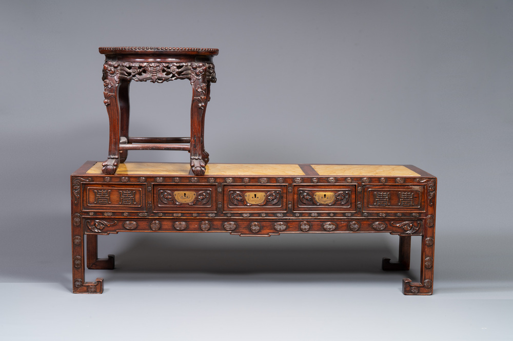 A Chinese carved wooden stand and a low table with marble tops, 19th C.