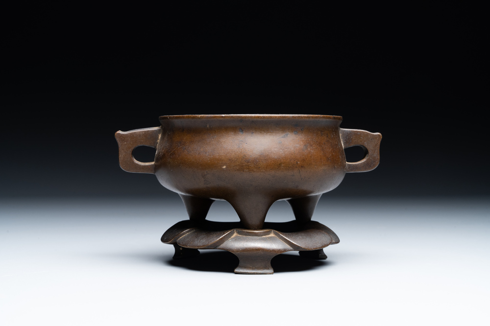 A Chinese bronze censer and stand, Xuande mark, 17th C.