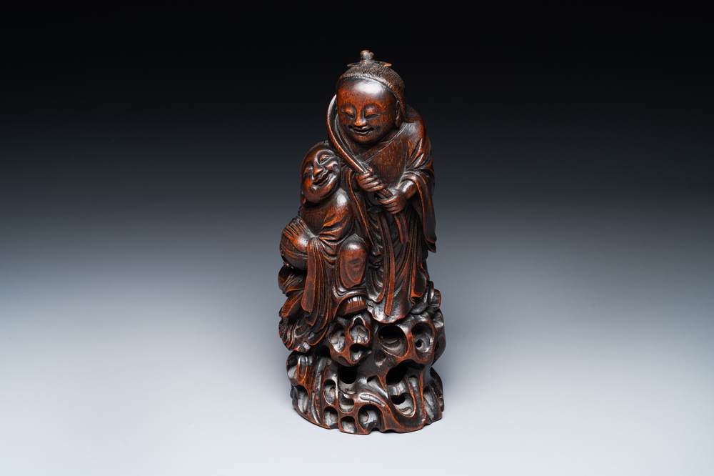 A large Chinese carved bamboo group of 'Hehe Erxian', 17th C.