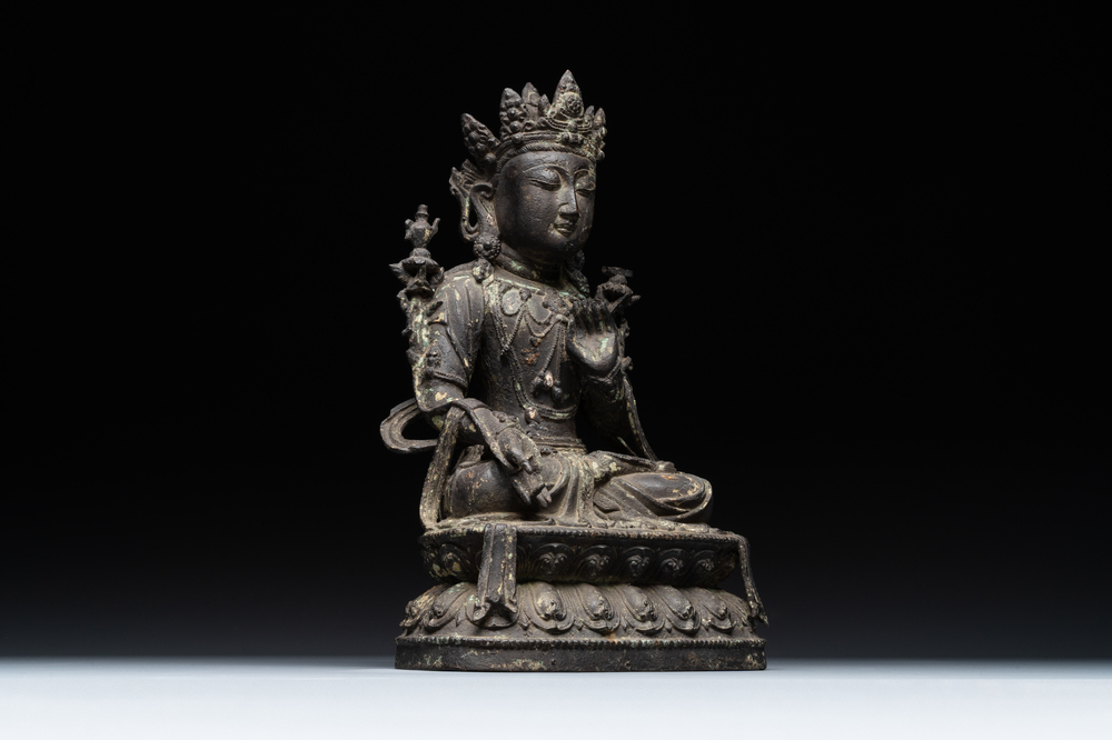 A large Chinese bronze sculpture of Bodhisattva on a lotus throne, Ming