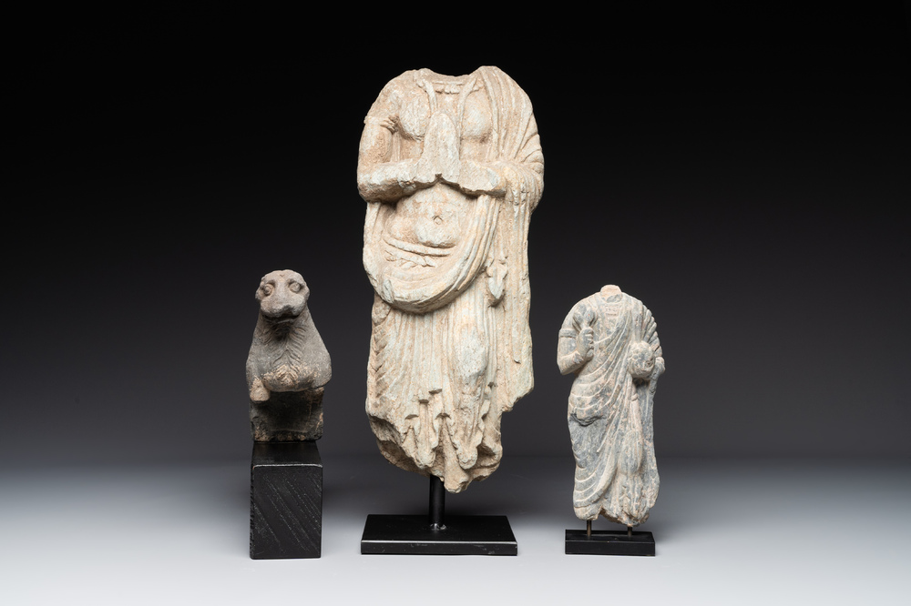Two Gandhara grey schist torsos of Buddha and a tiger sculpture, 1st/3rd C.