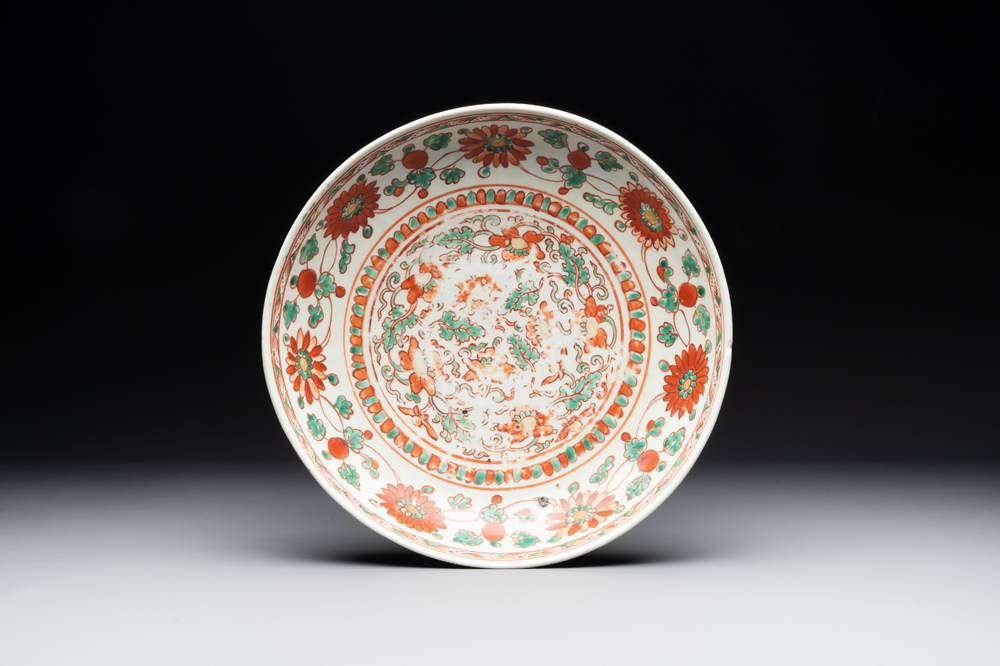 A Chinese red-and-green-enamelled 'chrysanthemum scroll' dish, Ming