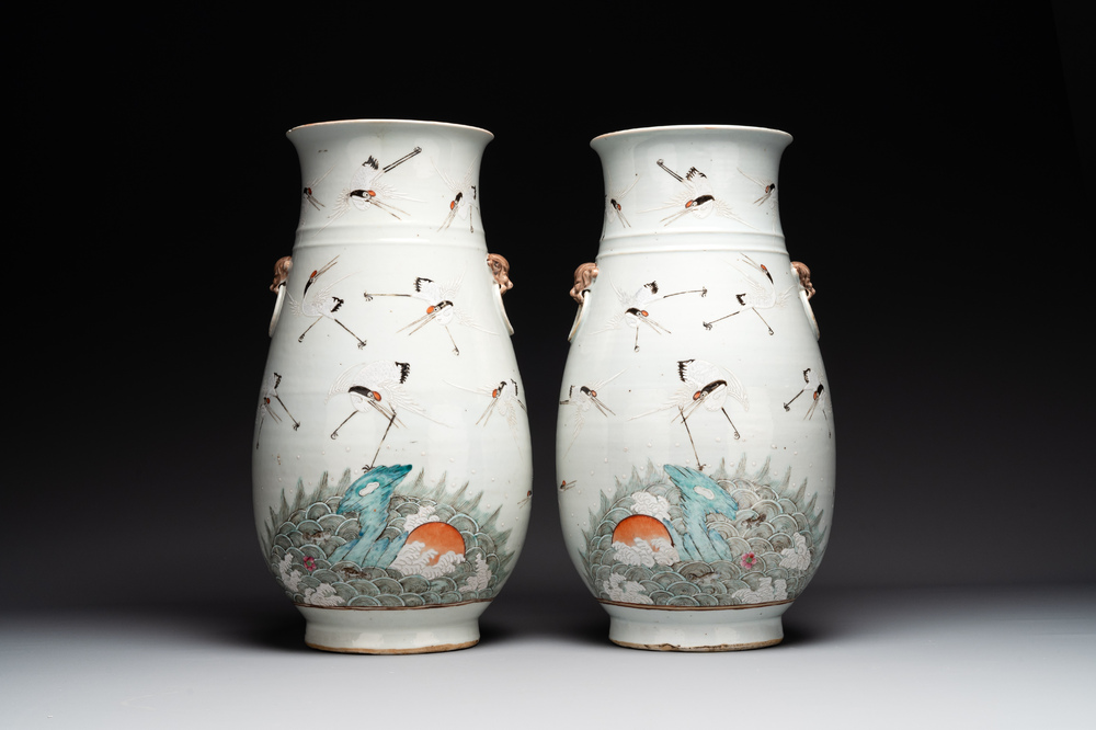 A pair of Chinese famille rose vases with cranes, 19th C.