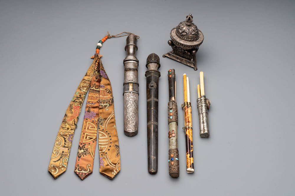 A varied collection of Chinese and Japanese eating set trousses, a Tibetan 'kapala' and two daggers, 18/19th C.