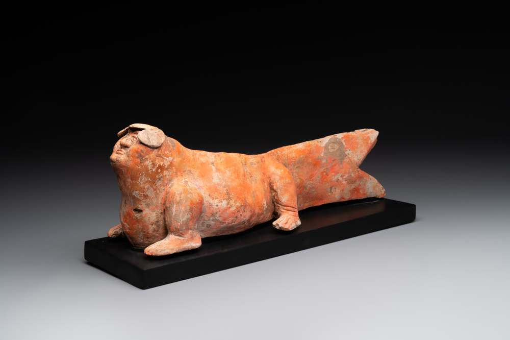 A Chinese Mingqi terracotta amphibian-shaped grave guardian with human head, Western Han