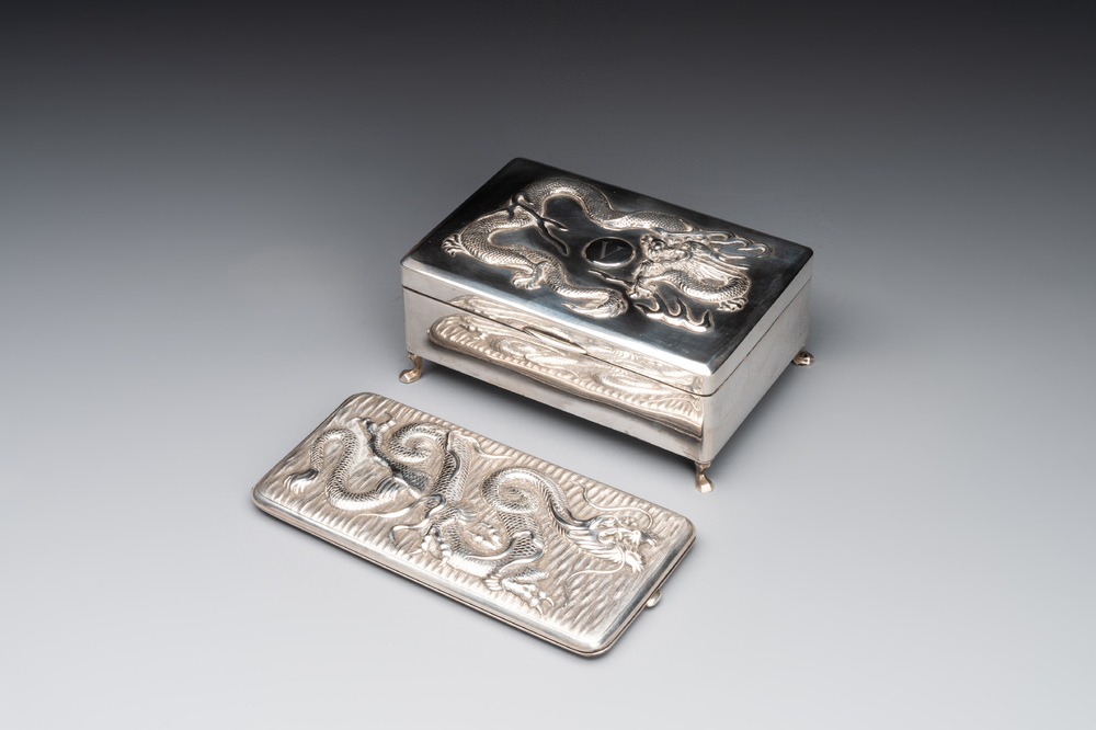 A Chinese silver 'dragon' box and a tobacco box, Sheng chang 昇昌 mark, 19th C.