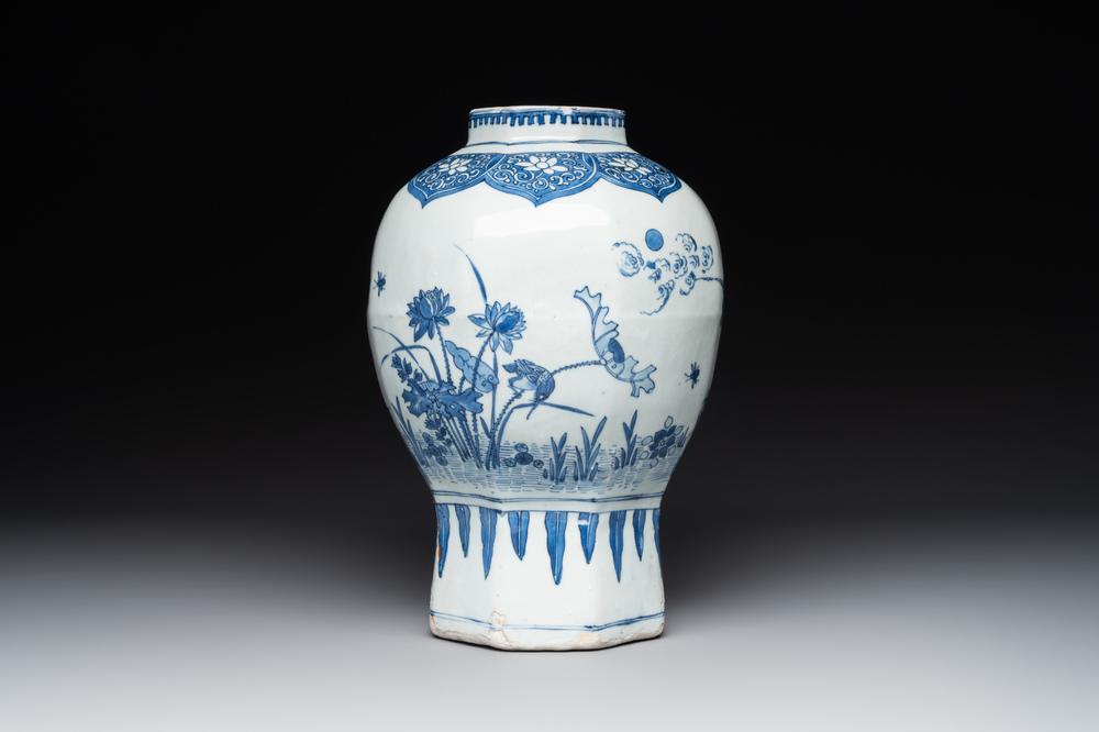 A Chinese octagonal blue and white 'birds and flowers' vase, Transitional period
