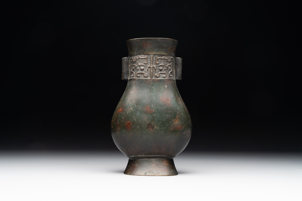 A Chinese silver-inlaid bronze arrow vase with Taotie design, 'touhu 投壺', Ming