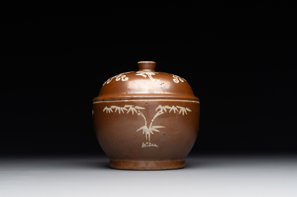 A Chinese slip-decorated brown-glazed 'three friends of winter' bowl and cover, Zhushan kilns, late Ming