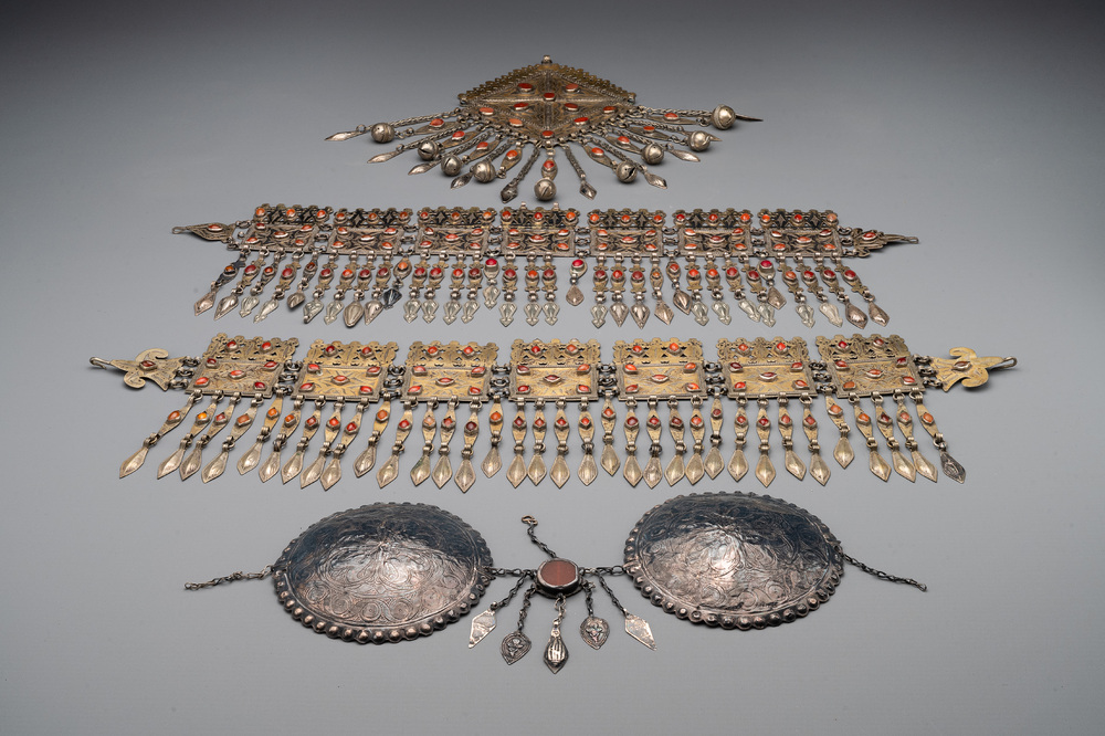 Three silver head ornaments and a chest ornament, Turkmenistan, 19/20th C.