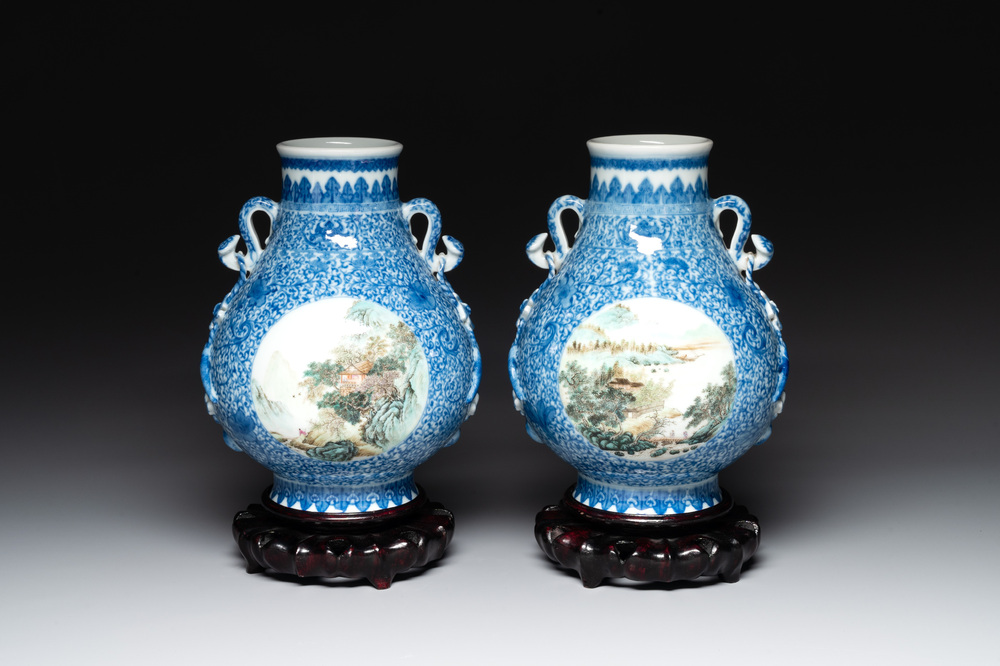 A pair of Chinese famille rose 'hu' vases with fine landscapes, Qianlong mark, Republic