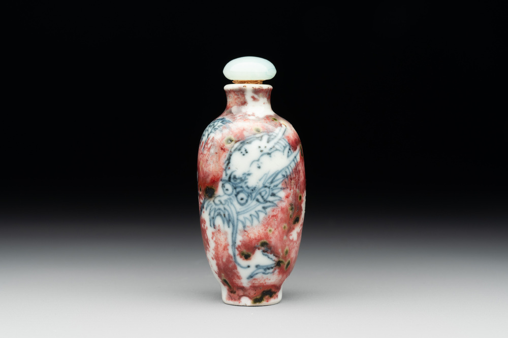 A Chinese blue, white and copper-red 'dragon' snuff bottle, Chenghua mark, 18th C.