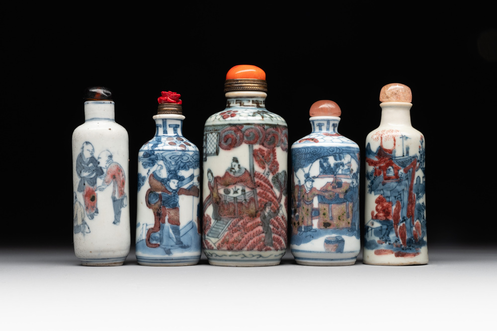 Five Chinese blue, white and copper-red snuff bottles, 19/20th C.