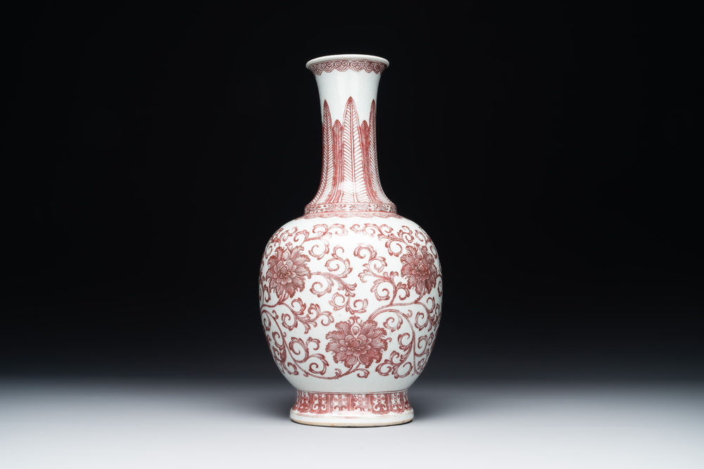 A Chinese copper-red-decorated 'lotus scroll' bottle vase, Qianlong