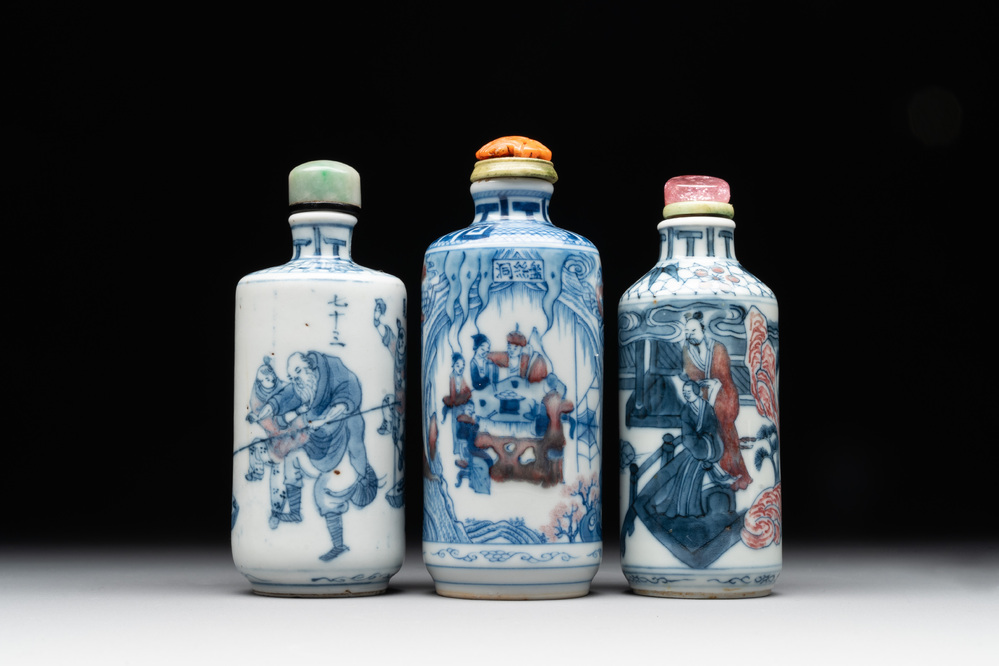 Three Chinese blue, white and copper-red snuff bottles, 19/20th C.