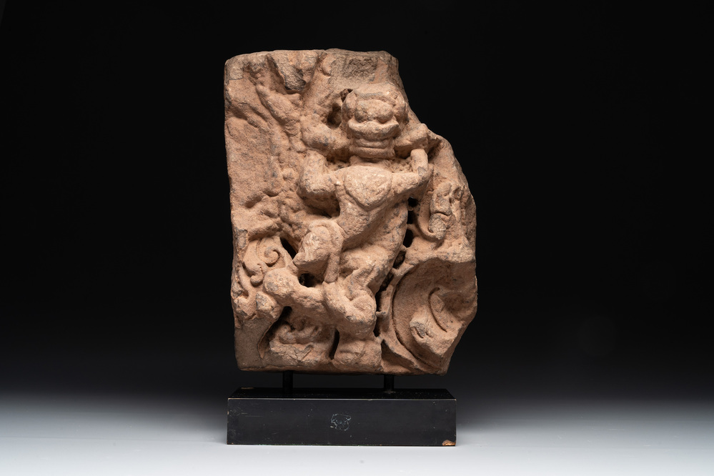 An architectural red sandstone fragment with a divinity, India, 13th C.