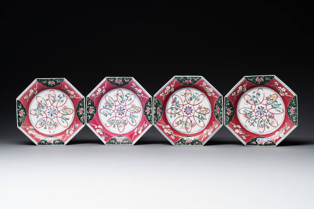 Four octagonal Chinese famille rose ruby-ground plates with floral design, Yongzheng