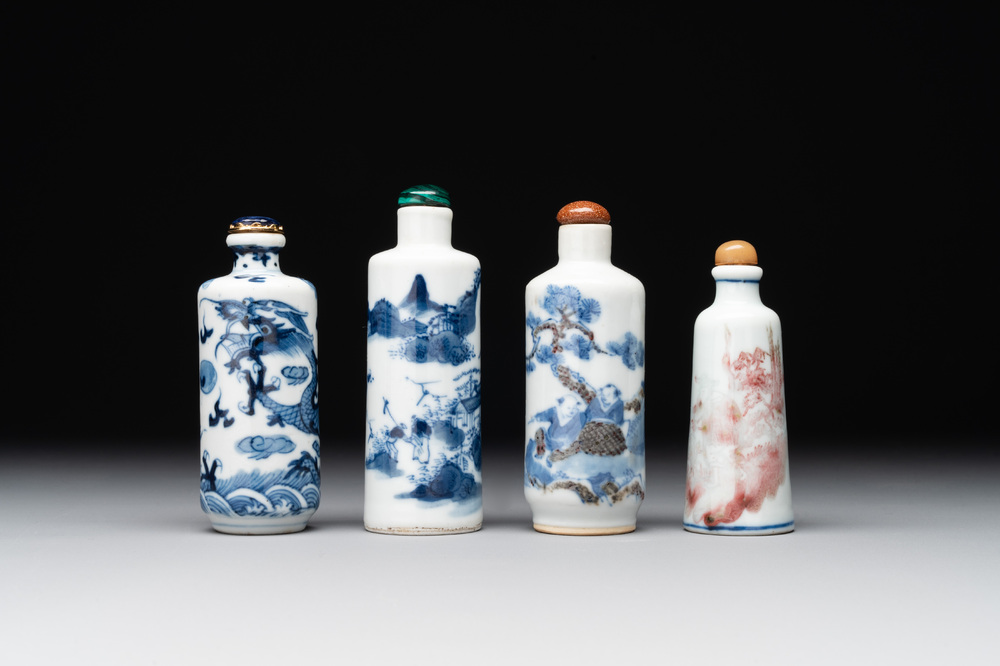 Two Chinese blue and white snuff bottles and two blue, white and copper-red snuff bottles, 19th C.