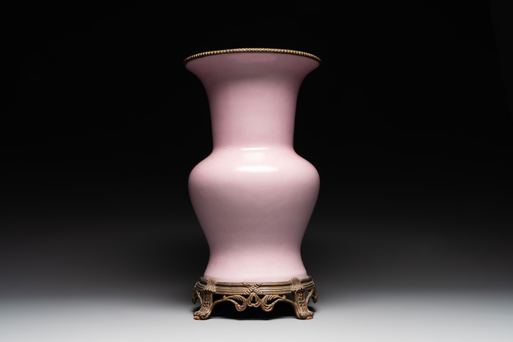 A large Chinese monochrome pink-glazed 'gu' vase with bronze mounts, 19/20th C.