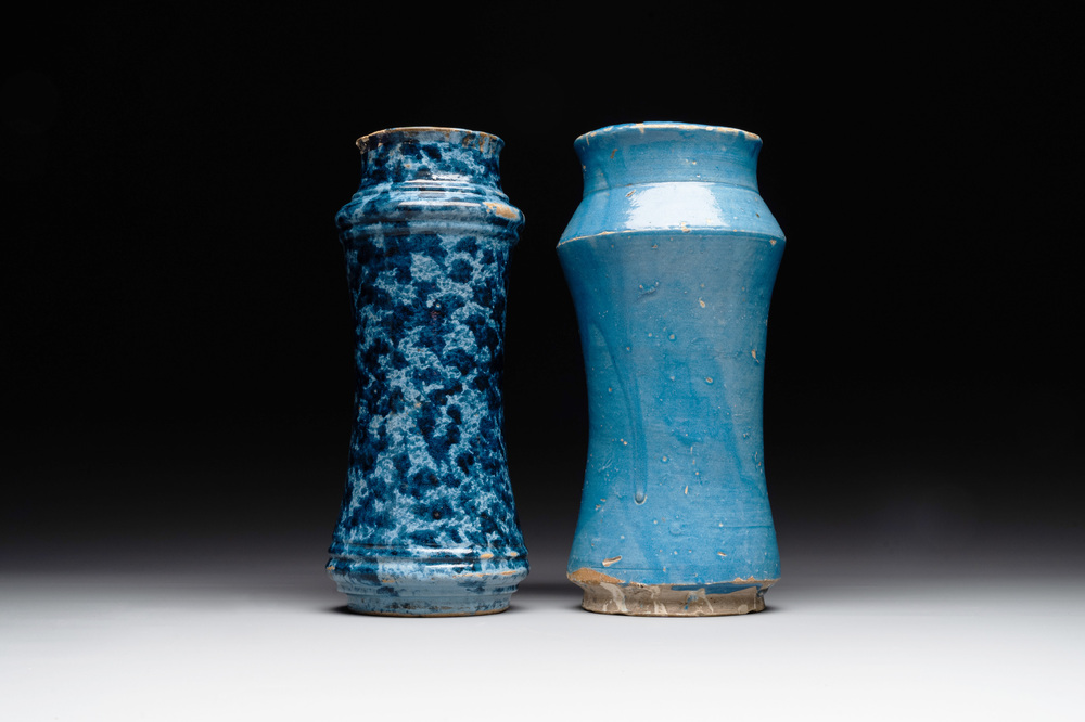 Two large monochrome and splashed blue pottery albarelli, Spain, 17th C.