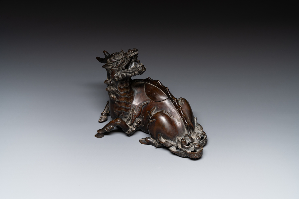 A fine Chinese bronze 'qilin' censer and cover, Ming