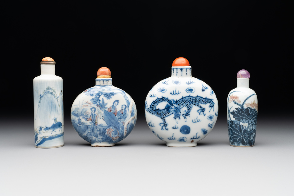 Three Chinese blue, white and copper-red snuff bottles and a blue and white snuff bottle, Qianlong mark, 19th C.