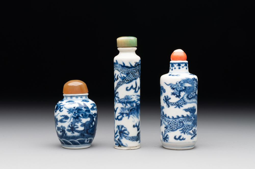 Three Chinese blue and white 'dragon' snuff bottles, 19th C.