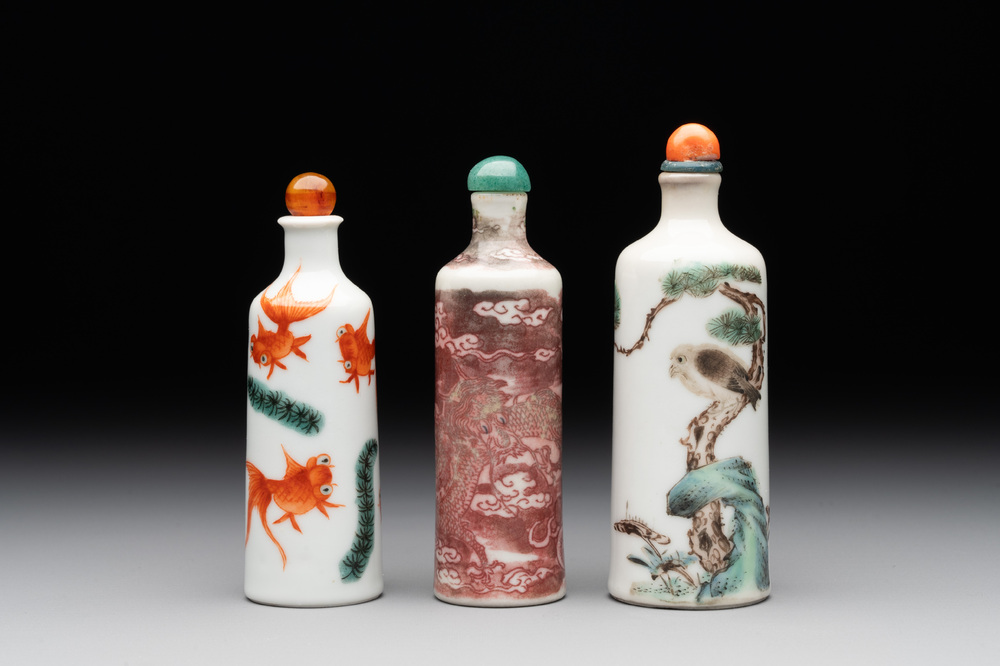 A Chinese copper-red 'dragon' snuff bottle and two famille verte snuff bottles, Gu Yue Xuan 古月軒 and Daoguang mark, 19th C.