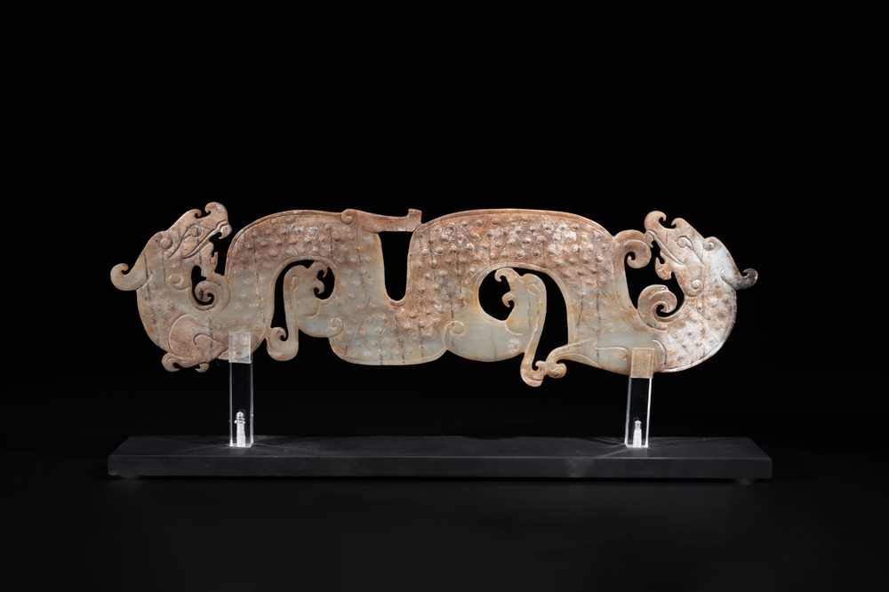 A Chinese nephrite jade ark-shaped 'chilong' plaque, Zhou/Han