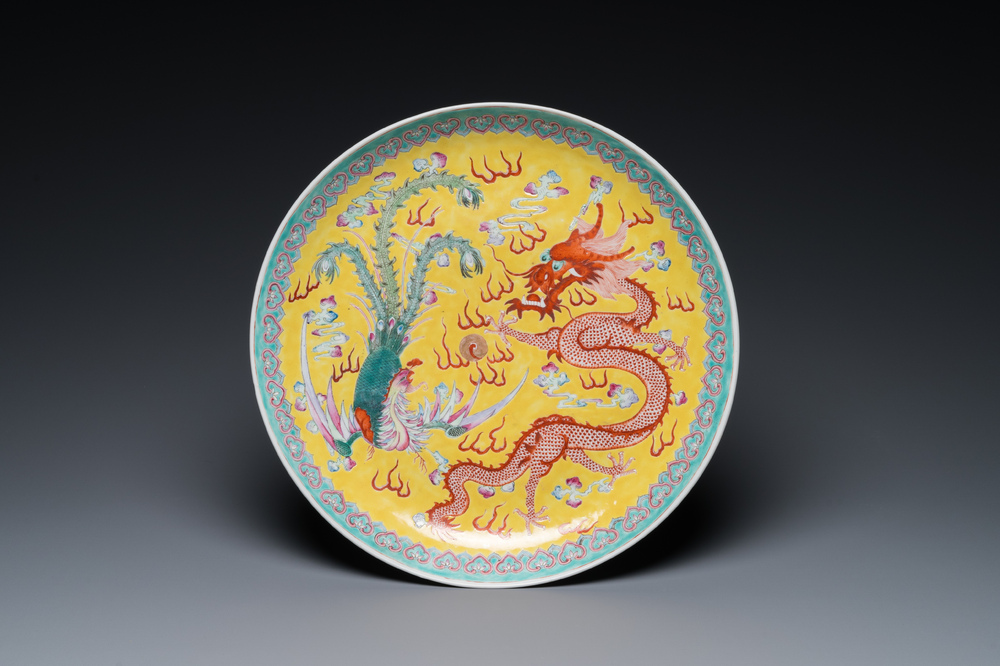 A Chinese famille rose yellow-ground 'dragon and phoenix' dish for the Straits or Peranakan market, Qianlong mark, 19th C.