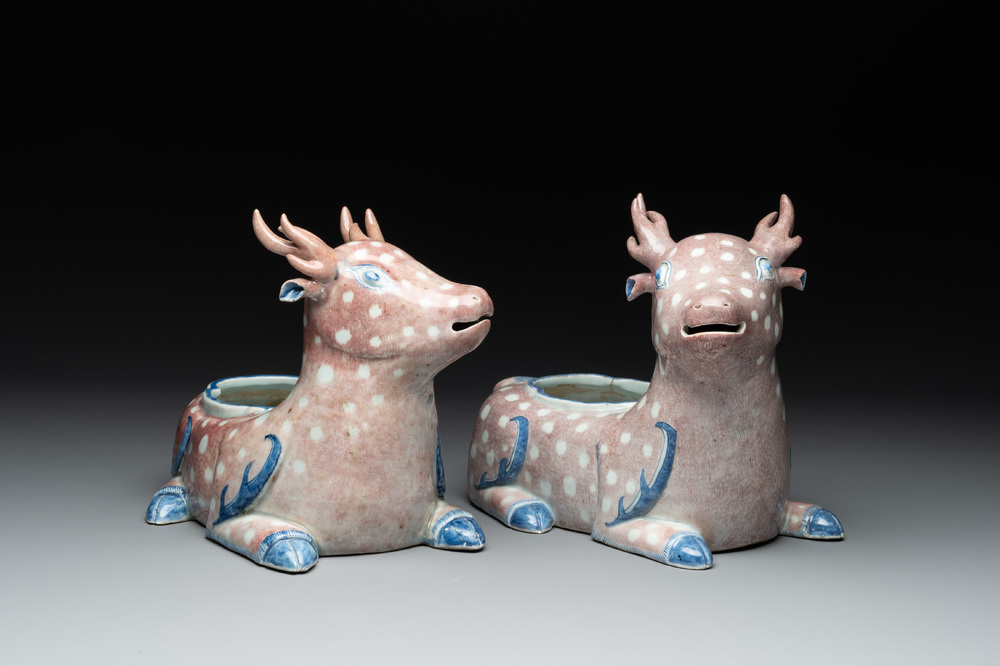 A pair of Chinese blue, white and copper-red stag-shaped jardini&egrave;res, 19th C.