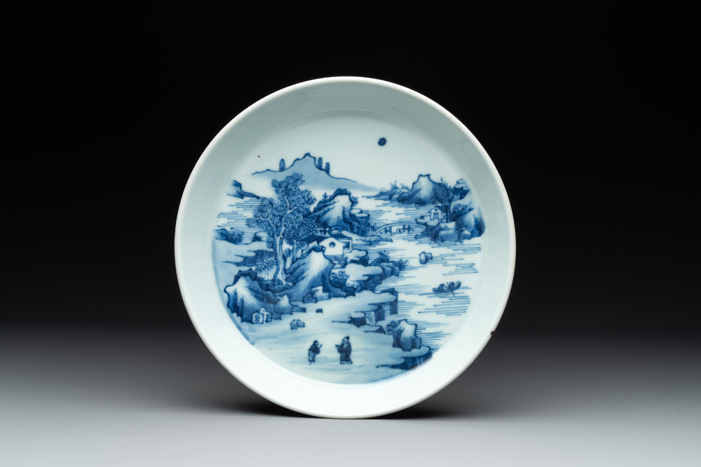 A Chinese blue and white 'river landscape' plate, 18/19th C.