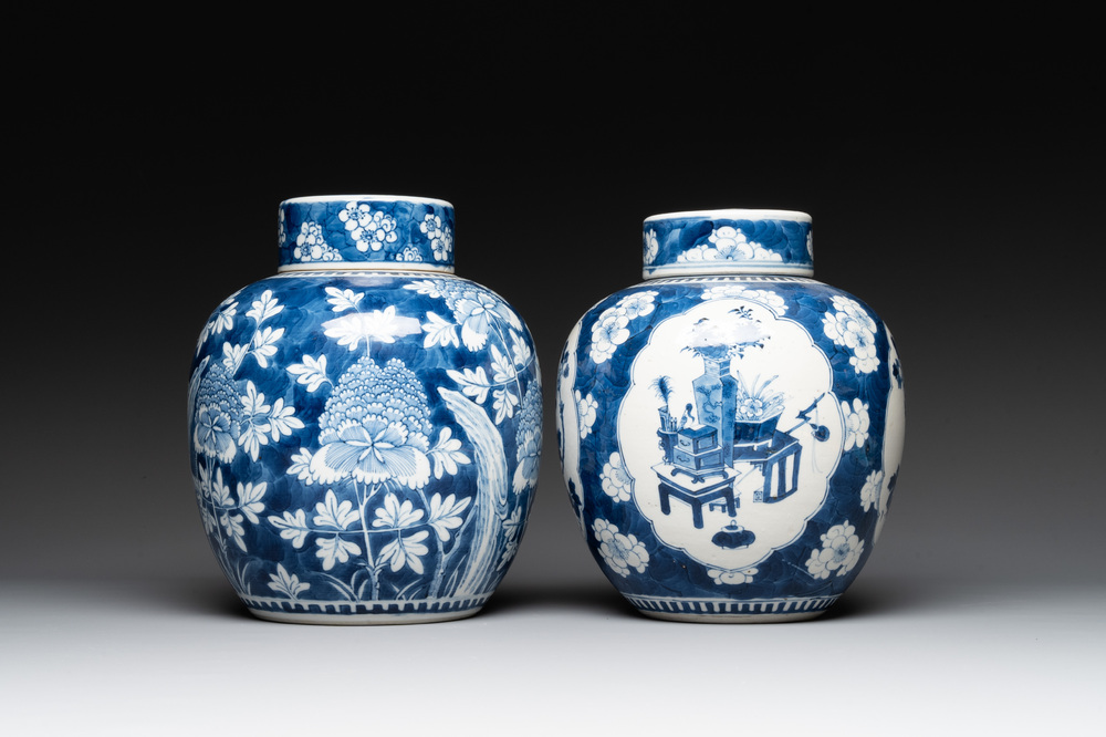 Two Chinese blue and white 'peonies' and 'peonies and antiquities' jars and covers, 19th C.