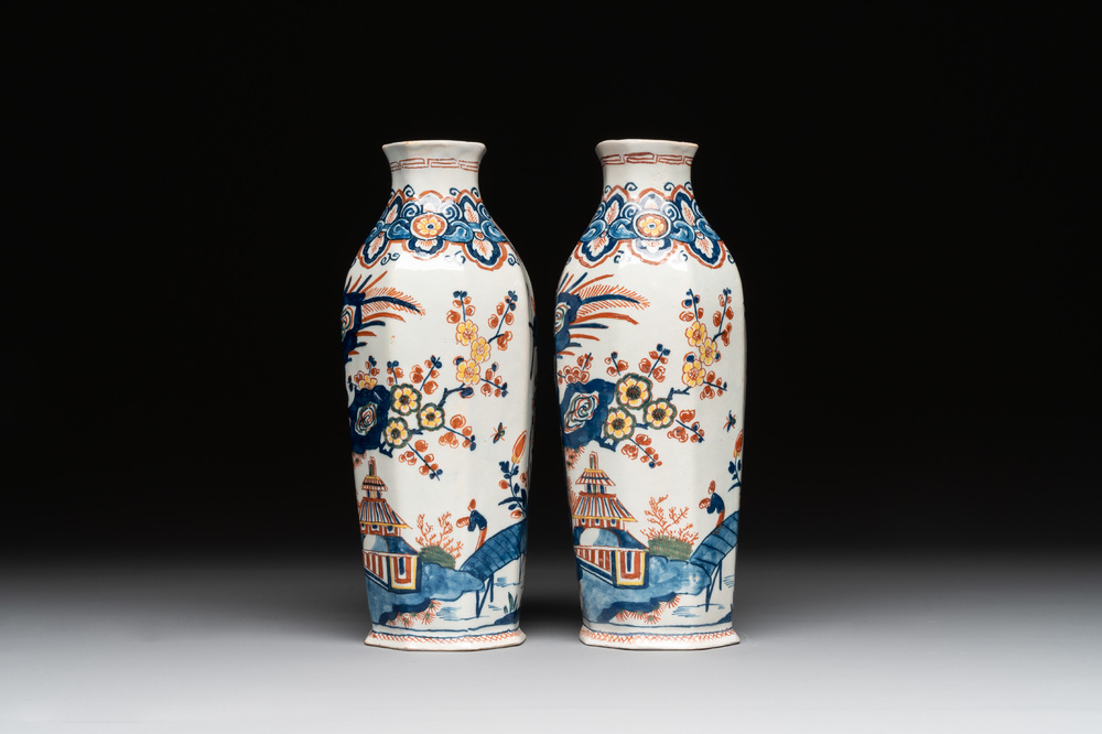 A pair of polychrome Dutch Delft octagonal chinoiserie vases, 18th C.