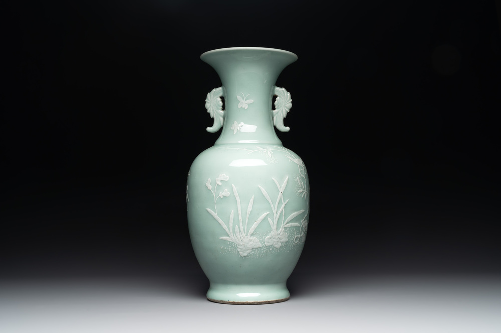 A Chinese slip-decorated celadon-glazed vase with floral design, Qianlong mark and of the period