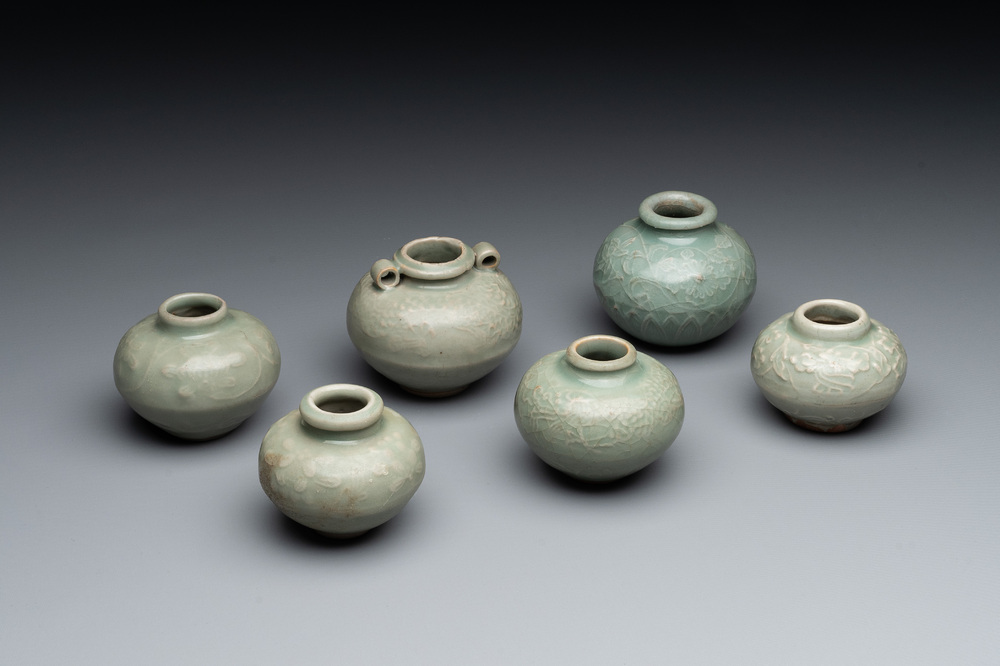 Six Chinese Longquan celadon jarlets with incised floral design, Yuan/Ming