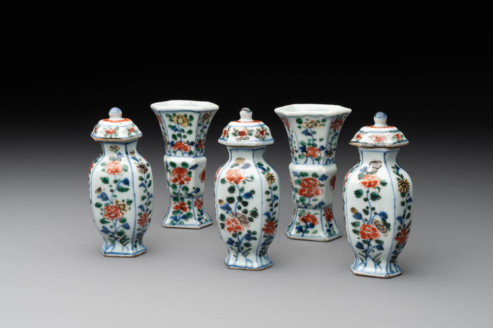 A rare Chinese famille verte garniture of five miniature vases with floral design, Kangxi