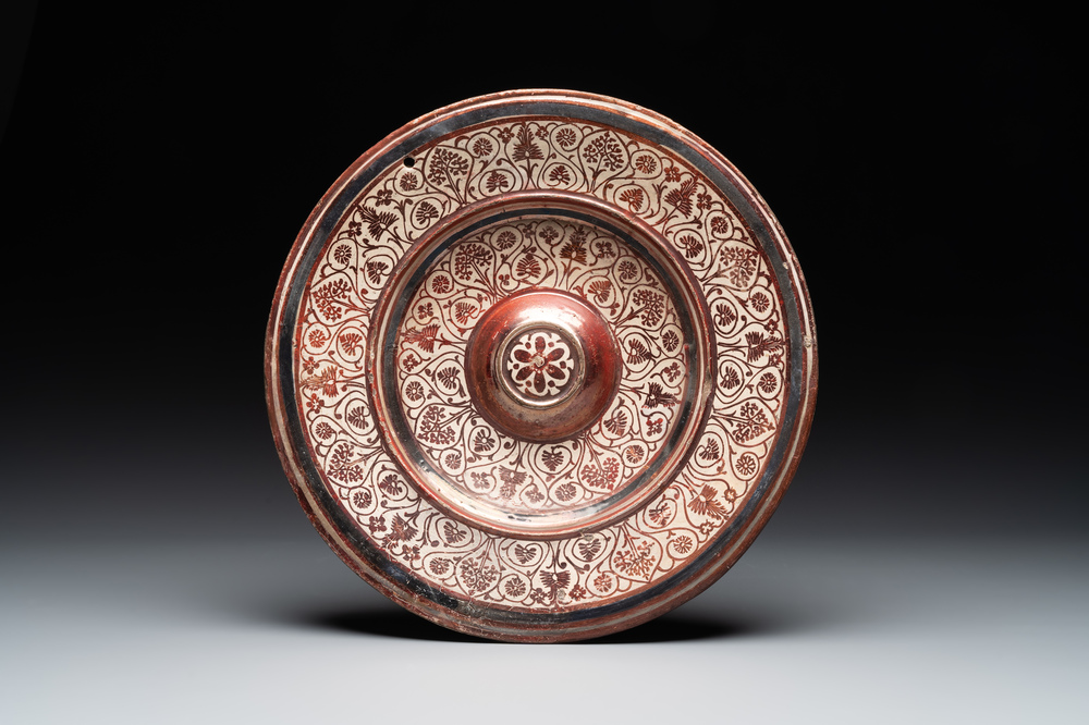 A Spanish Hispano-Moresque lustre-glazed dish with raised central medallion, Manises, 16th C.