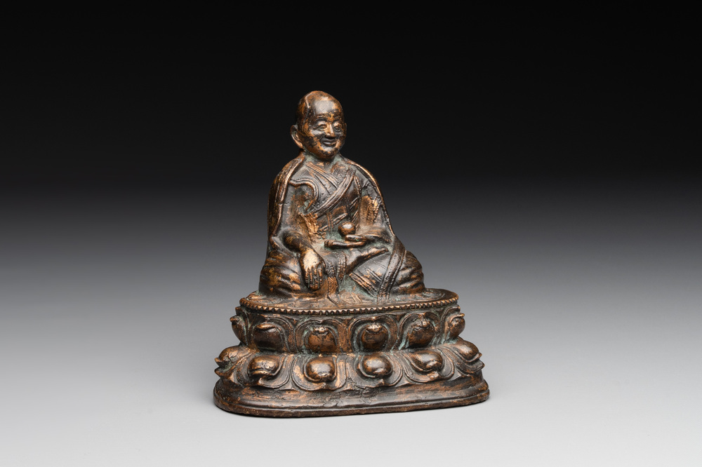 A Tibetan bronze Padmasambhava, 14th C.