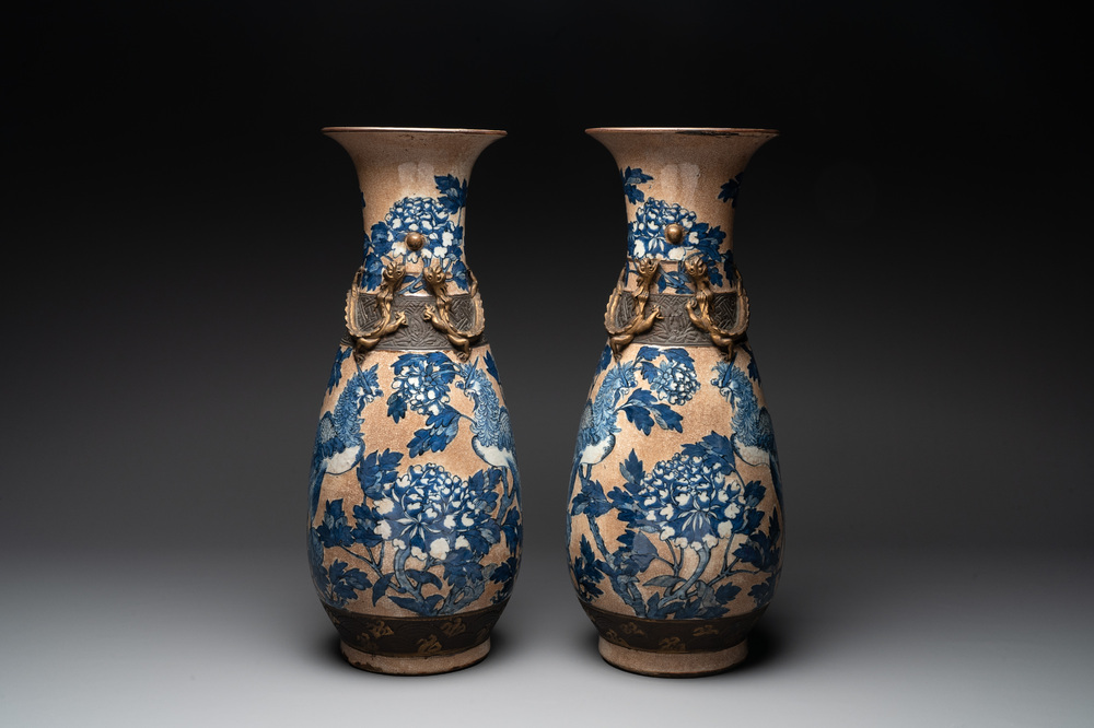 A pair of Chinese Nanking blue and white crackle-glazed 'phoenix' vases, 19th C.