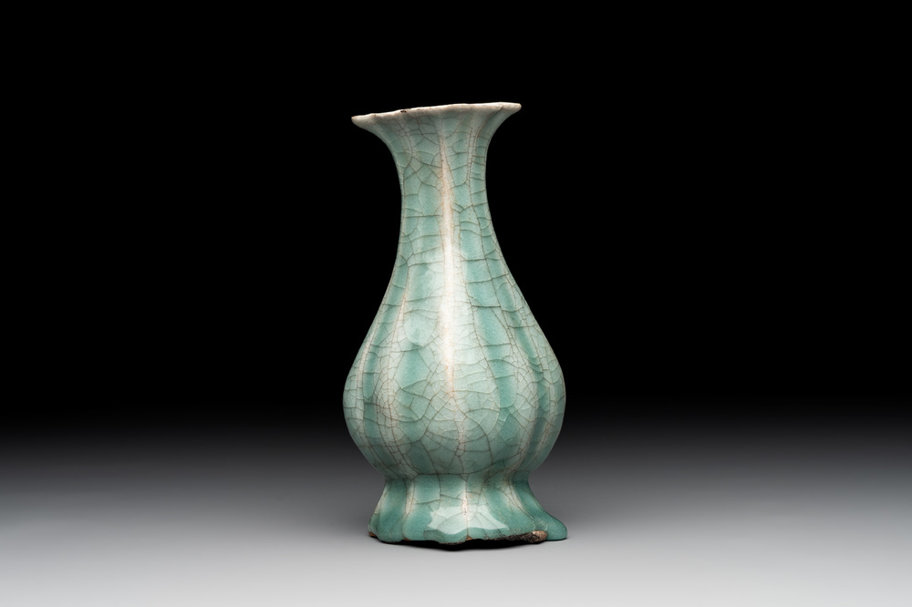 A Chinese Longquan celadon lobed bottle vase, Song