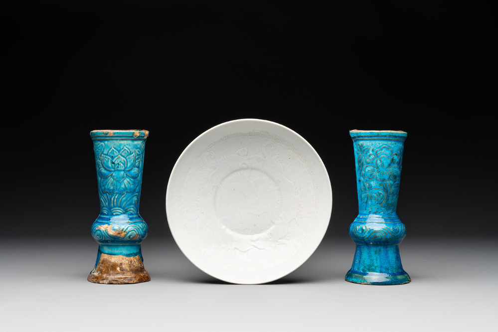 A Chinese incised white-glazed bowl and a pair of turquoise-glazed vases, Ming